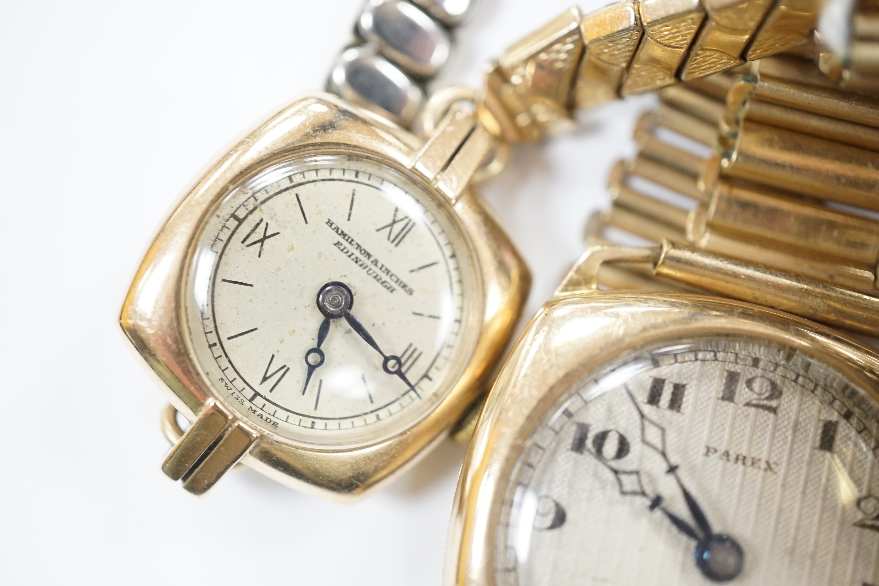 A gentleman's 1930's? yellow metal manual wind Parex wrist watch, on a gold plated bracelet, a lady's 9ct gold manual wind wrist watch, on a steel and gold plated strap and a gentleman's steel and gold plated Bulova Amba